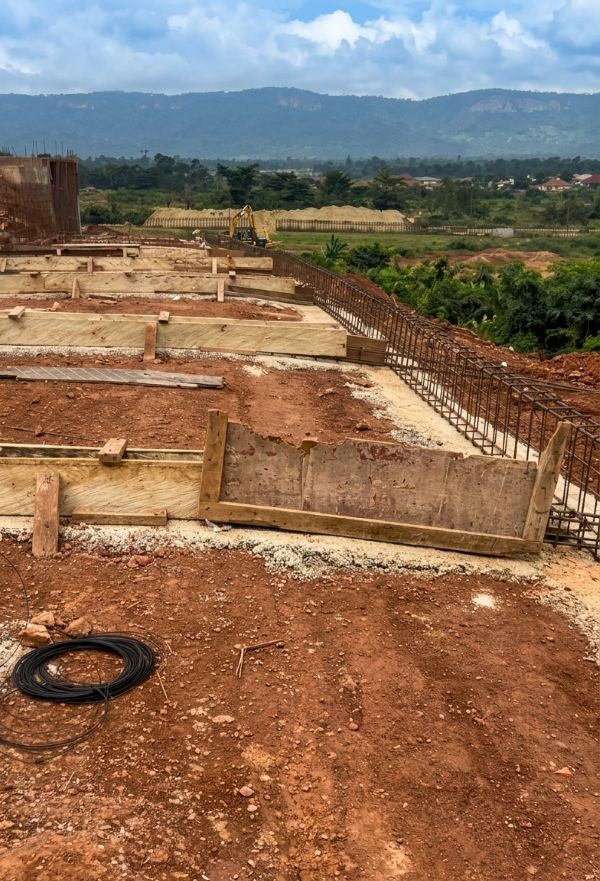 Site foundation formwork set up on an active construction plot.
